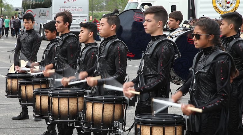 FILE PHOTO: More than 200 drum lines from places as far away as Thailand have converged in the Dayton region for WGI Sport of the Arts Percussion and Winds Championships.   TY GREENLEES / STAFF