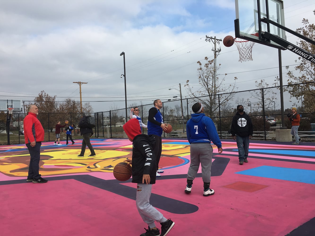 PHOTOS: Dayton’s youth enjoy their colorful, new Project Rebound  basketball court