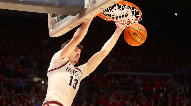Dayton's Isaac Jack dunks against Youngstown State on Friday, Nov. 24, 2023, at UD Arena. David Jablonski/Staff