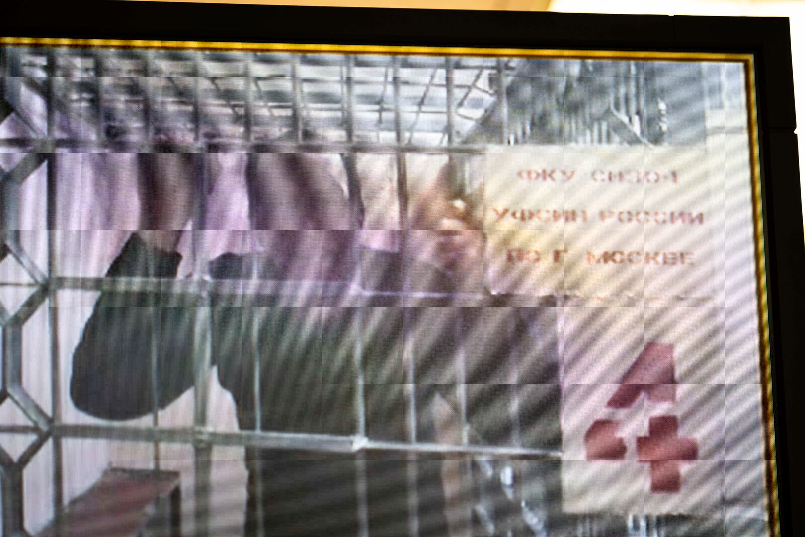 FILE - U.S. citizen Joseph Tater, who was detained for 15 days on charges of minor disorderly conduct in mid-August and then detained for a further two months on charges of attacking a police officer, is seen in a video link provided by the Russian Federal Penitentiary Service in the Moscow's City Court in Russia on Sept. 26, 2024. (AP Photo/Alexander Zemlianichenko, File)