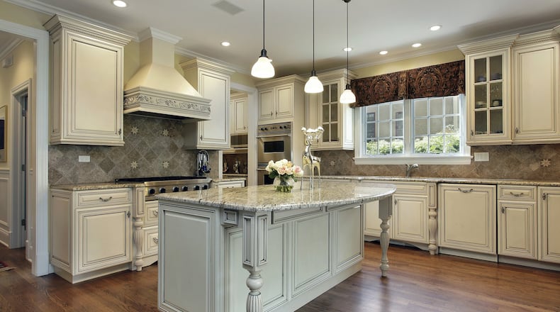 Furniture-style islands can add both character and functionality to your kitchen. (Dreamstime)