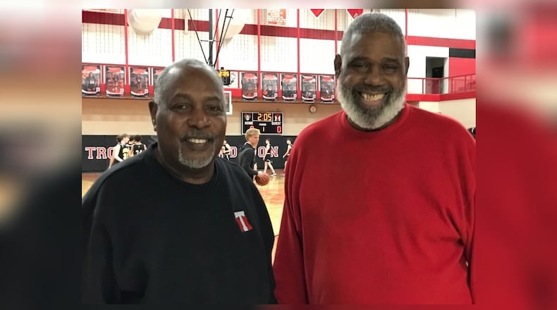 Trotwood-Madison head basketball coach Pete Pullen (right) and his longtime assistant Albert Powell in the Trotwood Madison gym this week. Tom Archdeacon/CONTRIBUTED