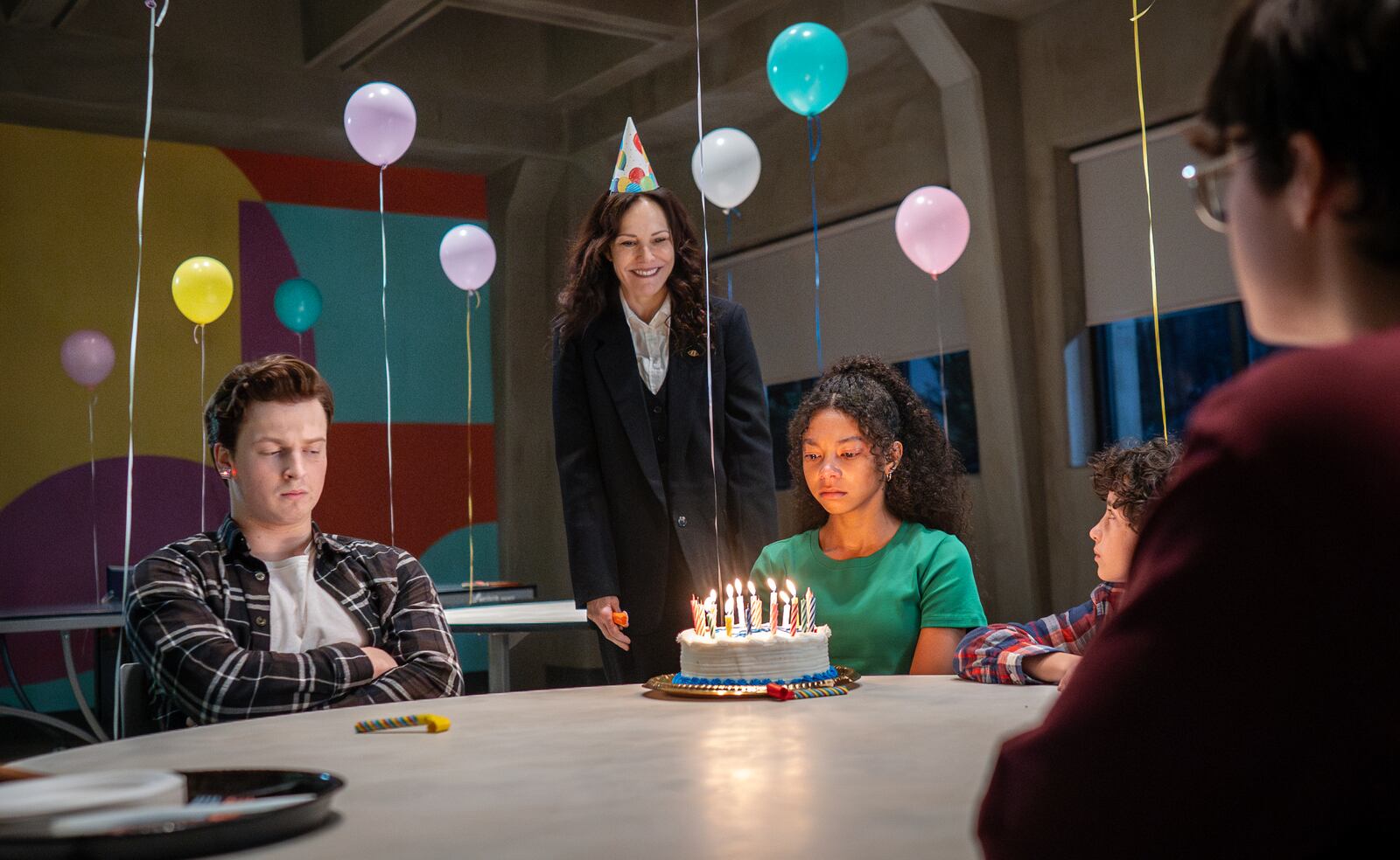 This image released by MGM+ shows Fionn Laird, from left, Mary-Louise Parker, Simone Miller, Viggo Hanvelt and Arlen So in a scene from "The Institute." (Chris Reardon/MGM+ via AP)