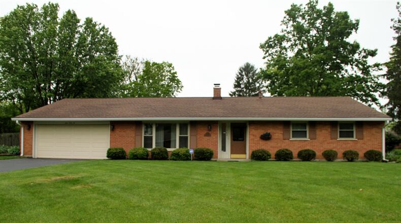 The 4-bedroom, brick ranch has about 2,050 square feet of living space, which includes a bonus room with rear exit. CONTRIBUTED PHOTOS BY KATHY TYLER