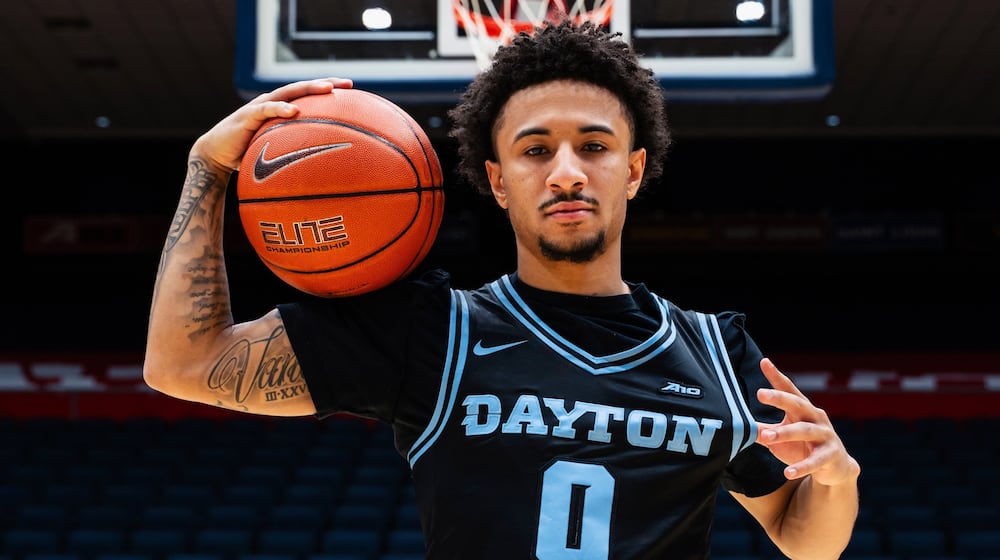 Dayton's Javon Bennett models the new black uniforms the Flyers will wear for the first time on Jan. 16, 2026, against Loyola Chicago at UD Arena. Photo courtesy of UD