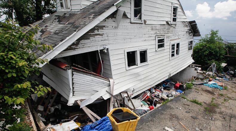 Harrison Twp. has received tentative approval to use FEMA funds to demolish this house on Maplegrove Avenue rocked off its foundation by a Memorial Day 2019 tornado. CHRIS STEWART / STAFF