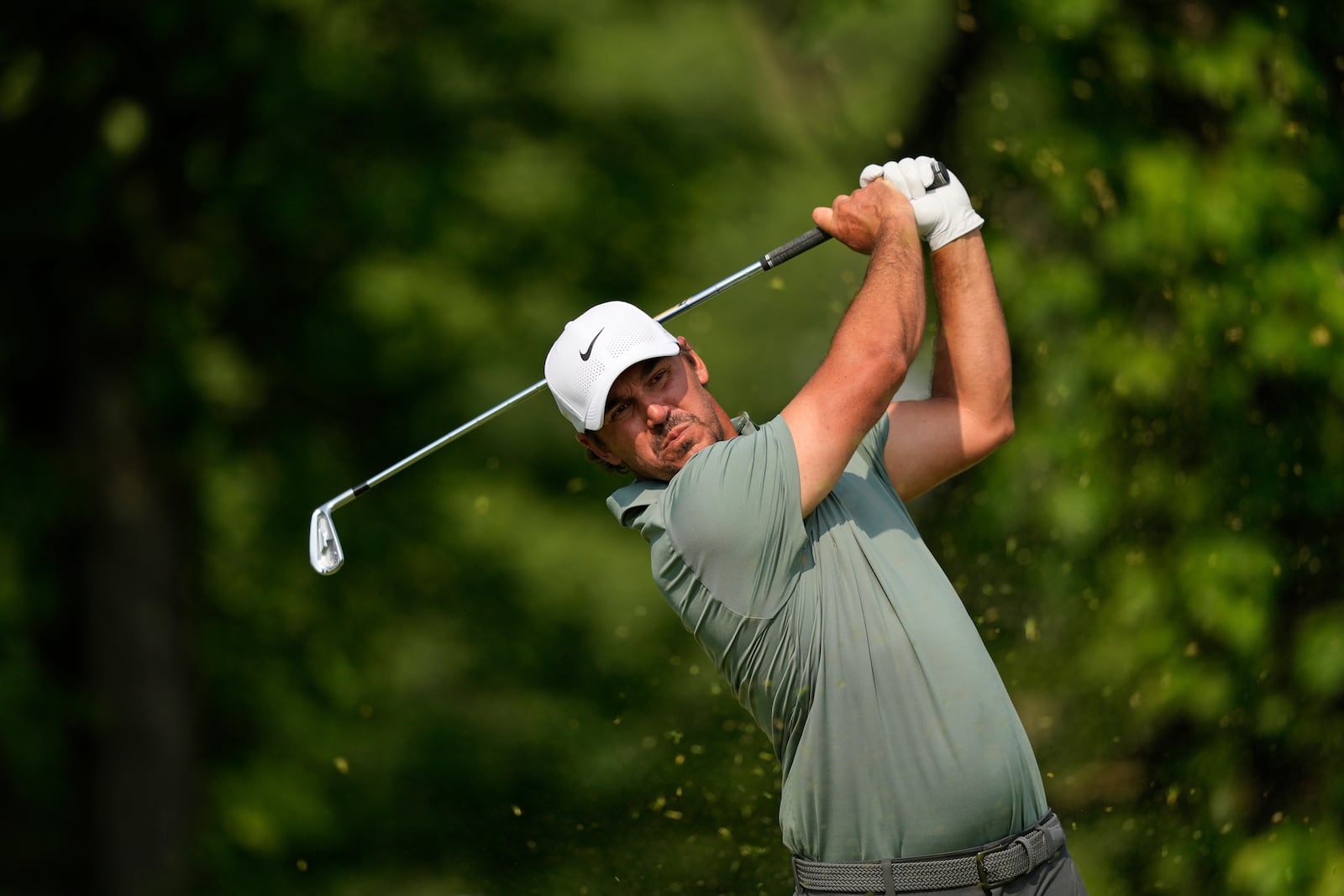 Brooks Koepka tees off on the 13th hole during the first round of the U.S. Open golf tournament at Oakmont Country Club Thursday, June 12, 2025, in Oakmont, Pa. (AP Photo/Carolyn Kaster)