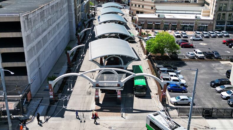 Dayton RTA buses exit the hub in downtown Dayton Wednesday, April 22, 2025. NICK GRAHAM/STAFF