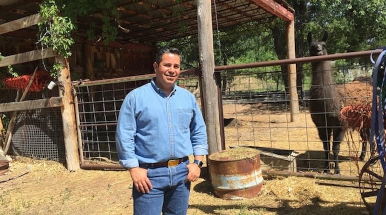 Rep. Ben Ray Lujan, chairman of the Democratic Congressional Campaign Committee, at his family farm in New Mexico. (Lisa Mascaro/Los Angeles Times/TNS)