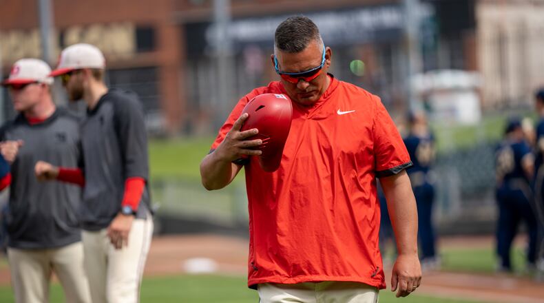 Dayton's Jayson King coaches during a series against George Washington at Day Air Ballpark in Dayton in May 2021. Photo by Ryan Phillips