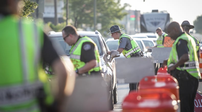 The Dayton Post of the Ohio State Highway Patrol in conjunction with the Montgomery County OVI Task Force conducted an OVI checkpoint on U.S. 35 west at state Route 49 in July 2019. STAFF