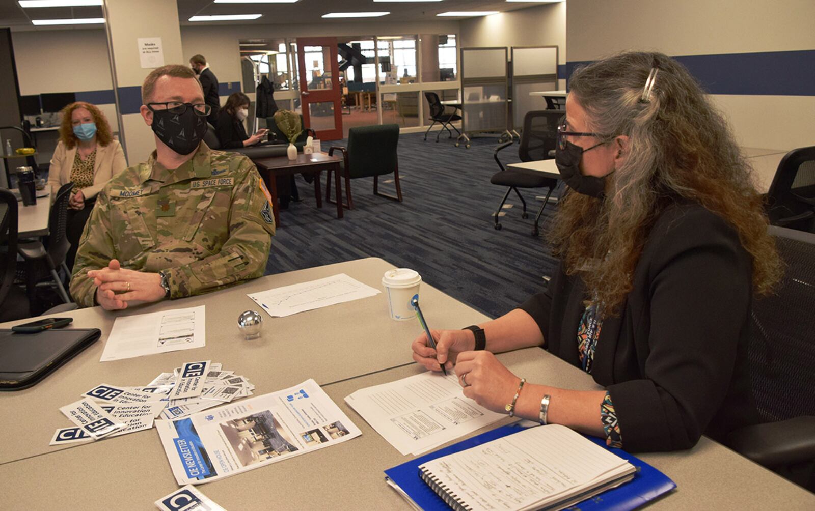 During a student-leader roundtable Feb. 8, Space Force Maj. Daniel Moomey talks about his Air Force Institute of Technology doctoral program in space systems with Dr. Wendy Walsh, Air Education and Training Command’s chief learning officer. U.S. AIR FORCE PHOTO/KATIE SCOTT