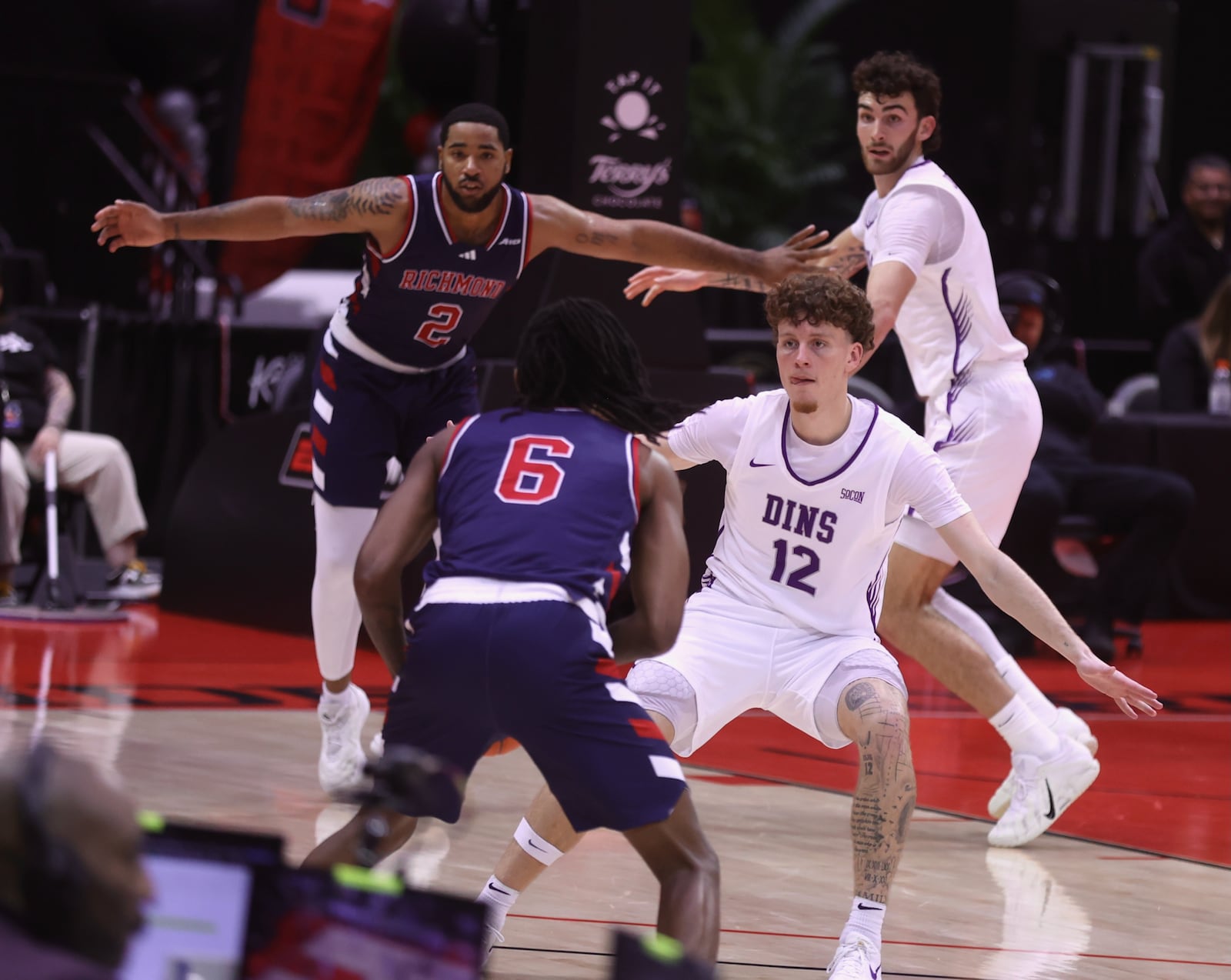 Centerville graduate Tom House (12), a senior at Furman, plays against Richmond in the first round of the ESPN Events Invitational on Thursday, Nov. 27, 2025, at the State Farm Field House in Kissimmee, Fla. David Jablonski/Staff