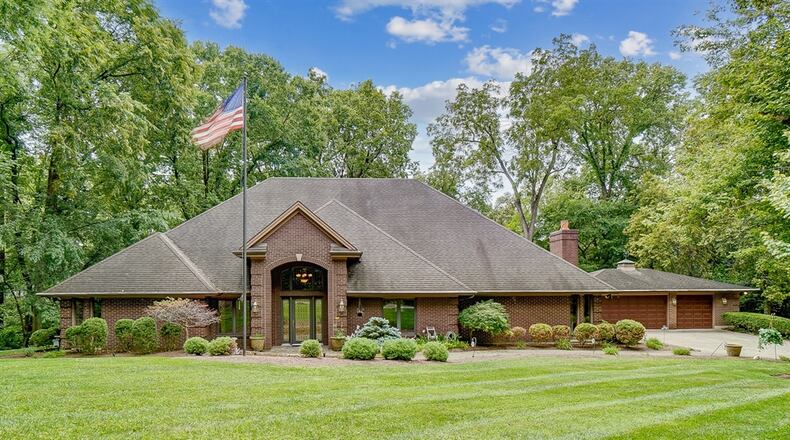 Listed for $699,000 by Coldwell Banker Heritage, the brick house at 1211 Runnymede Road offers about 3,737 square feet of living space. Contributed photos