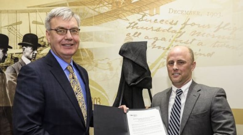 Ohio Higher Education chancellor John Carey awards Wright State’s Kevin Lorson the “Chancellor’s Award.”