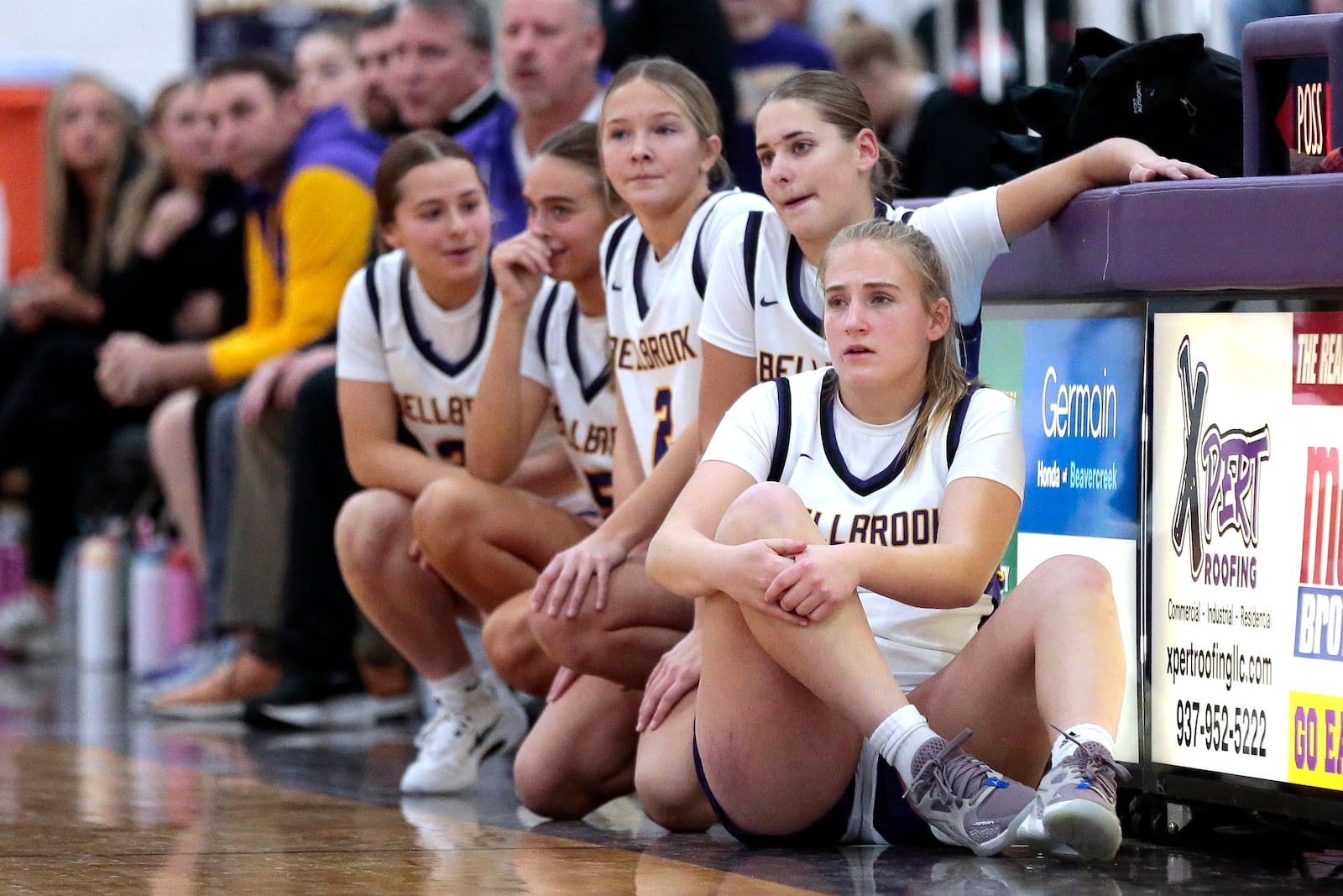 Five Bellbrook players wait next to the scorers table to check-in during their game against Kings on Mon., Dec. 1, 2025 in Bellbrook. STEVEN WRIGHT / STAFF