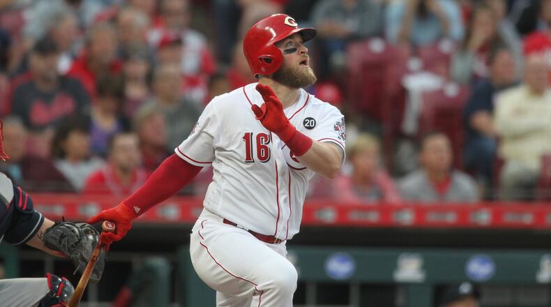 The Reds Tucker Barnhart hits a home run in the fourth inning against the Braves on Tuesday, April 23, 2019, at Great American Ball Park in Cincinnati. David Jablonski/Staff