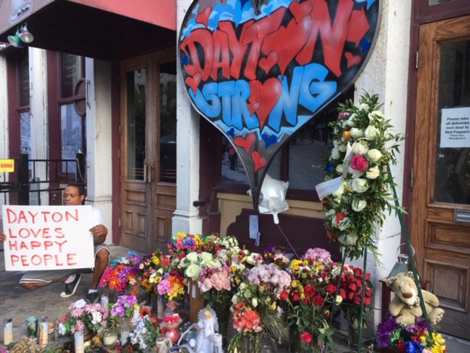 A memorial near Ned Peppers bar in the Oregon District, photographed Aug. 7. THOMAS GNAU/STAFF