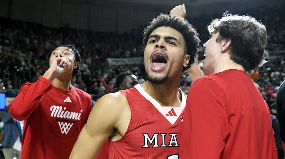 Miami (Ohio) guard Trey Perry reacts after defeating Ohio in an NCAA college basketball game, Friday, March 6, 2026, in Athens, Ohio. (AP Photo/HG Biggs)
