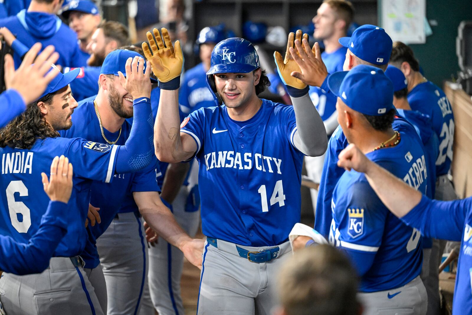 Kansas City Royals' Jac Caglianone celebrates in the dugout after hitting his second home run of the game, and the second of his career, in the dugout in the ninth inning during a baseball game against the Texas Rangers, Thursday, June 19, 2025, Arlington, Texas. (AP Photo/Albert Pena)