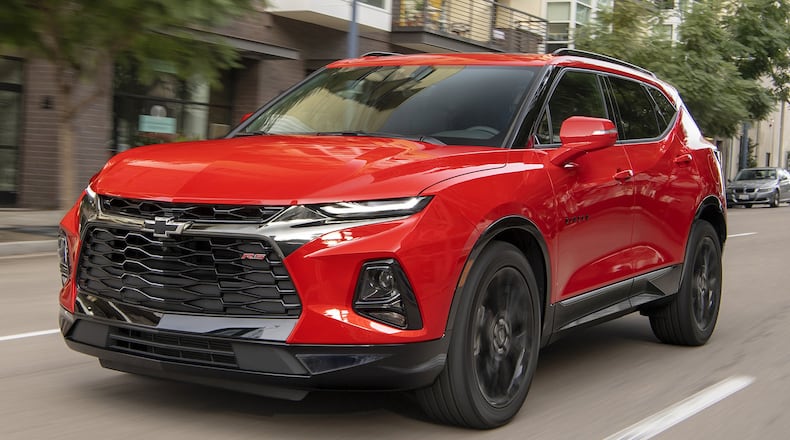 The 2019 Chevrolet Blazer is an all-new midsize SUV offered in L, Blazer, RS and Premier trims sharing a wide stance, tight proportions and a high beltline. A leather-wrapped steering wheel and shift knob are standard. Chevrolet photo
