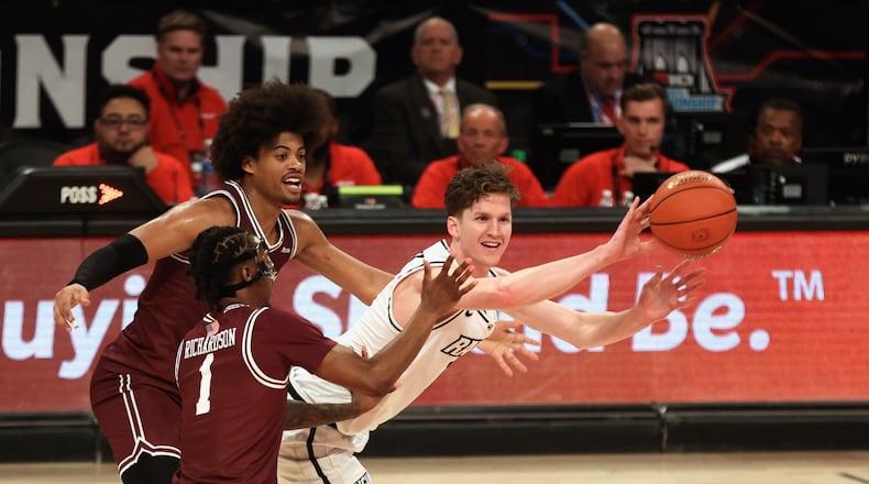 Virginia Commonwealth's Sean Bairstow is trapped by Fordham in the second half of an Atlantic 10 Conference second-round game on Wednesday, March 13, 2024, at the Barclays Center in Brooklyn, N.Y. David Jablonski/Staff