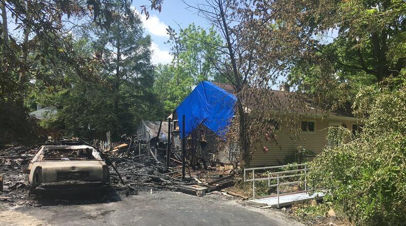 An elderly disabled couple faced death during last night’s torrential storm as a fire broke out in their home, but a good Samaritan pulled them out of their residence in Yellow Springs and also saved their dog.