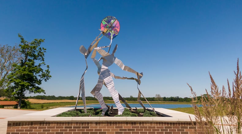 The sculpture Celebration at Cornerstone of Centerville is part of the gateway to Cornerstone Park, a 20-acre site that is expected to be completed this fall. CONTRIBUTED