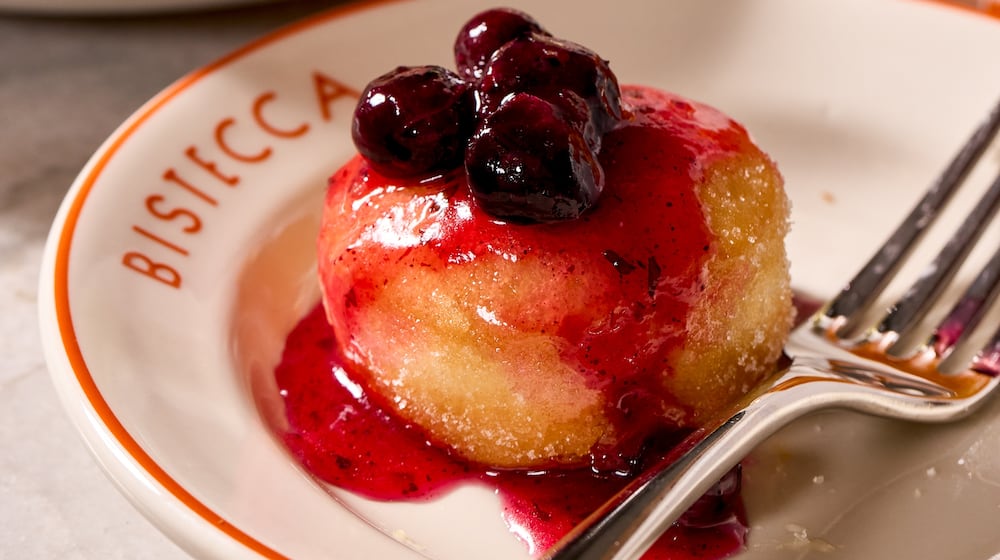 Bistecca, an upscale Italian steakhouse inspired by the flavors and aromas of Tuscany, officially opened its doors on Wednesday, April 2, 2025. Pictured is the Mini Bomboloni (PHOTO CREDIT: BRANDON SMITH).