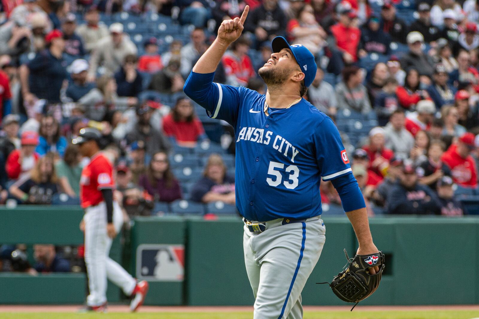 Kansas City Royals relief pitcher Carlos Estevez (53) reacts after the final out against the Cleveland Guardians at the end of a baseball game in Cleveland, Sunday, April 13, 2025. (AP Photo/Phil Long)