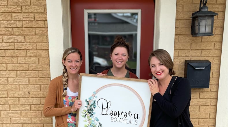 From left, Sara Zimmerman, Krissy Gordin, and Emily Prince, have opened a new shop, Bloomora Botanicals in Tipp City. CONTRIBUTED