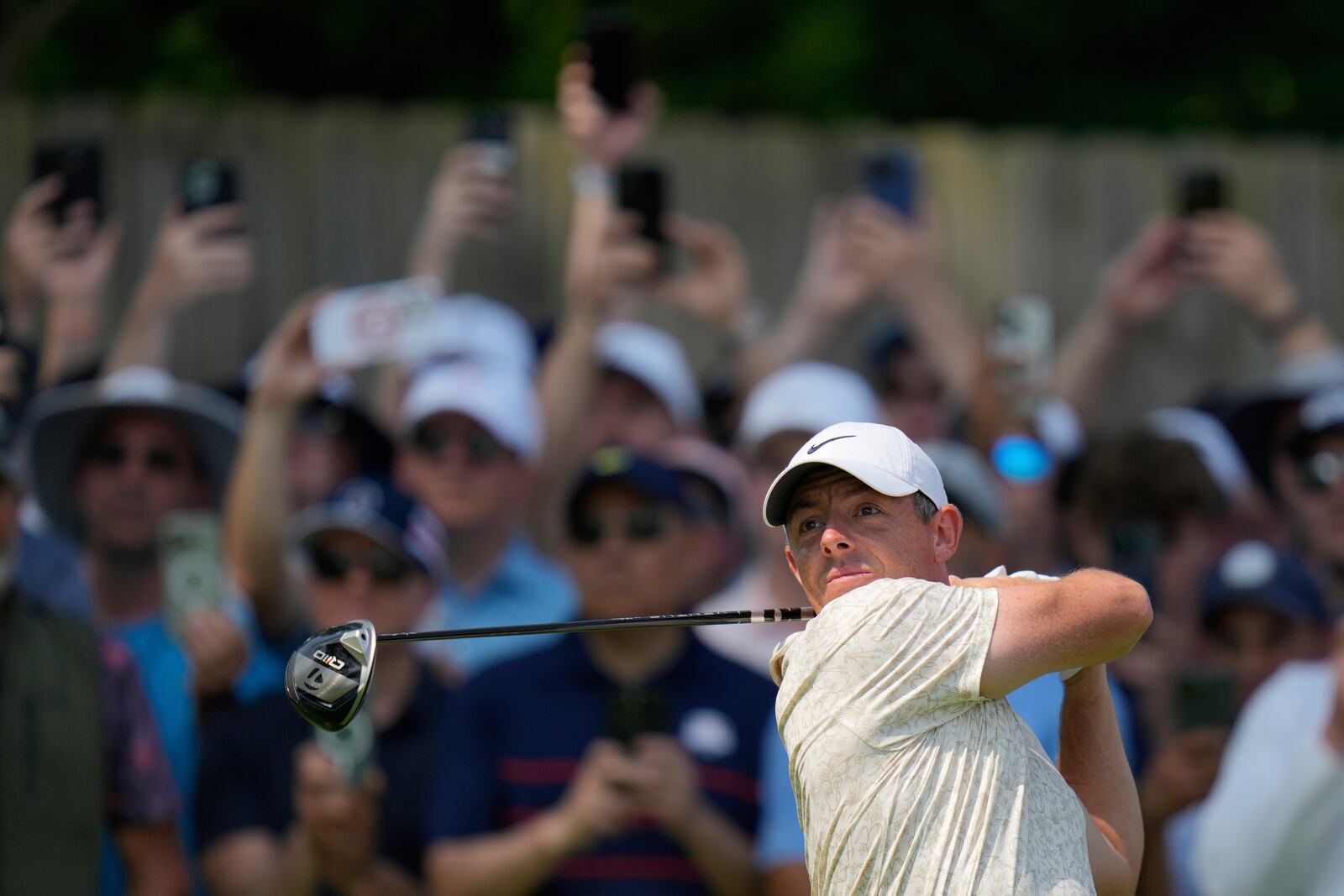 Rory McIlroy, of Northern Ireland, tees off on the second hole during the first round of the U.S. Open golf tournament at Oakmont Country Club Thursday, June 12, 2025, in Oakmont, Pa. (AP Photo/Seth Wenig)