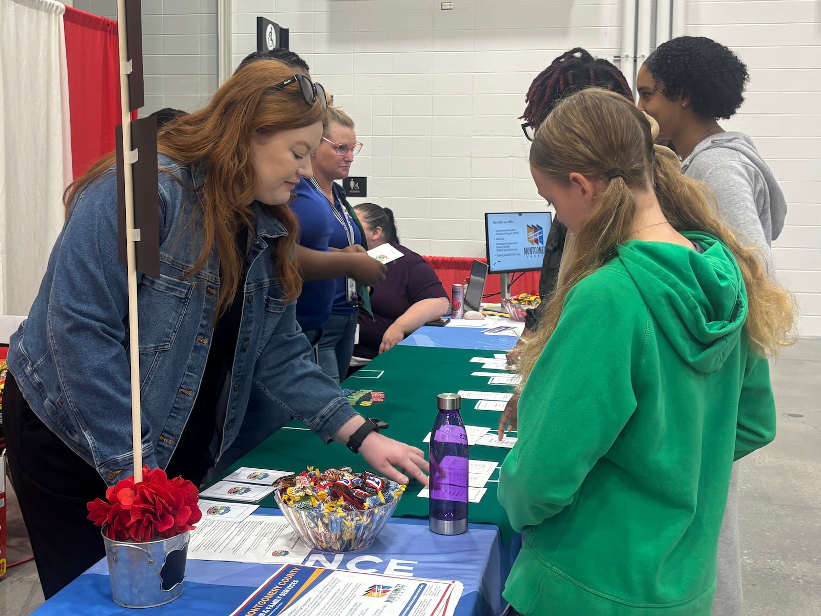 Employees from Montgomery County Job & Family Services speak to students during a career fair Wednesday, Oct. 8. Eileen McClory/ staff