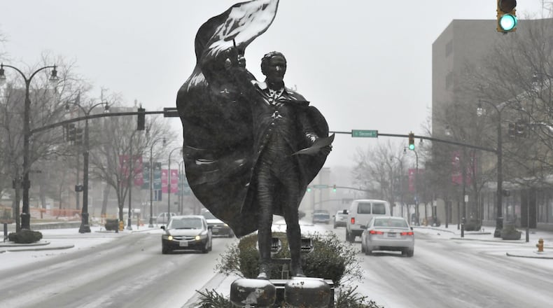 The statue of Alexander Hamilton in a median on High Street in downtown Hamilton is a salute to the city’s namesake. MICHAEL D. PITMAN/STAFF