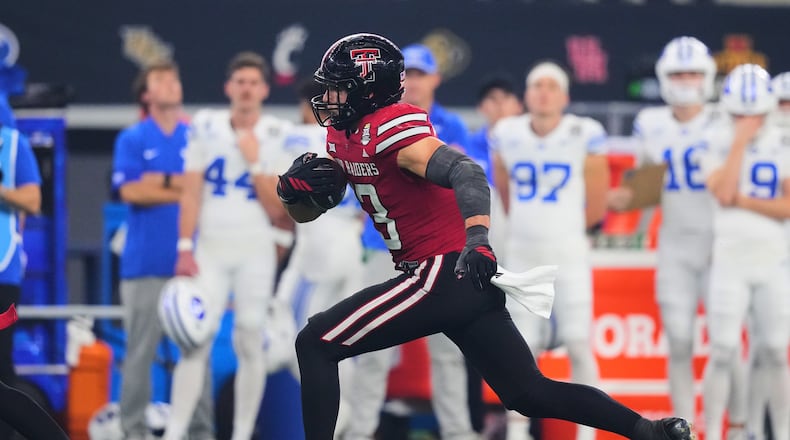 Texas Tech linebacker Ben Roberts intercepts a BYU pass in the second half of a Big 12 Conference championship NCAA college football game Saturday, Dec. 6, 2025, in Arlington, Texas. (AP Photo/Julio Cortez)