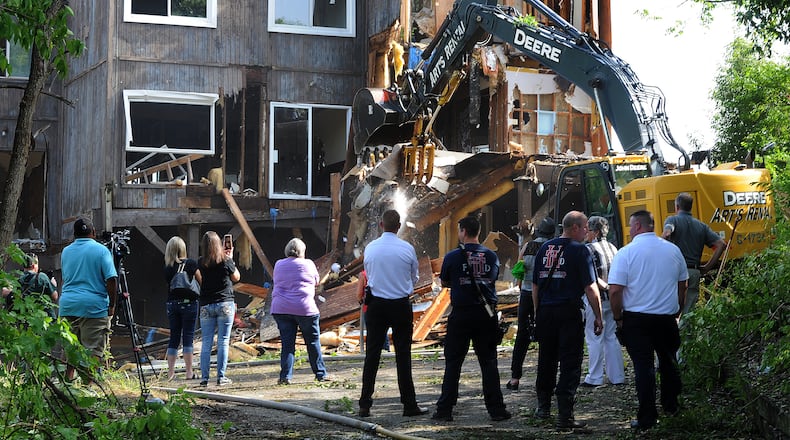Demolition began on a five-unit condominium on Lofty Oaks Lane in Harrison Township Friday Aug. 5, 2022. The condominium was damage by a tornado Memorial Day 2019. MARSHALL GORBY\STAFF