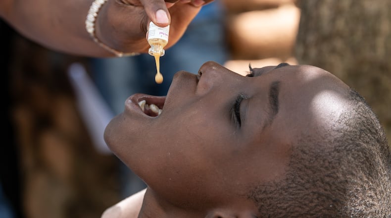 A health worker administers a cholera vaccine in Blantyre, southern Malawi, Thursday, Jan. 22, 2026. (AP Photo/Thoko Chikondi)