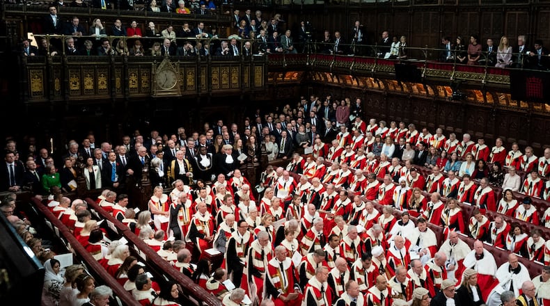 FILE - Members of the House of Commons and Lords during the State Opening of Parliament, in the House of Lords, in London, Tuesday, Nov. 7, 2023. (Aaron Chown/Pool Photo via AP, File)