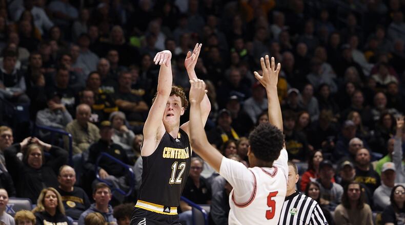 Centerville's Tom House puts up a shot over Fairfield's Owen Bronston during their Division I regional basketball final Saturday, March 12, 2022 at Xavier University's Cintas Center in Cincinnati. Centerville won 55-39. NICK GRAHAM/STAFF