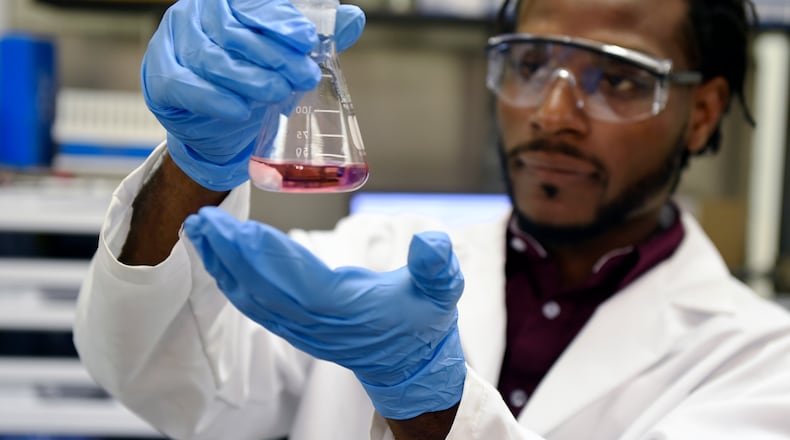 Morgan State physics major Derick Buckles works in the lab during a 10-week internship at the Naval Research Laboratory in Washington. (U.S. Navy photo by John F. Williams/Released)