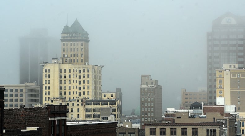 Dense Fog over downton Dayton Wednesday, July 19, 2023. MARSHALL GORBY\STAFF
