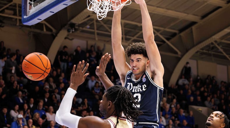 Duke's Cameron Boozer dunks during the second half of an NCAA college basketball game against Boston College in Durham, N.C., Tuesday, Feb. 3, 2026. (AP Photo/Ben McKeown)