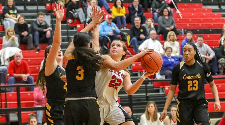 Tecumseh High School senior Corinne Thomas shoots the ball in traffic during the Arrows game against Centerville on Monday night in New Carlisle. The Elks won 73-56. CONTRIBUTED PHOTO BY MICHAEL COOPER