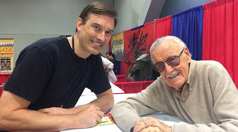 Miami University Visiting Professor Robert Batchelor wrote a book about American comic book icon Stan Lee (right), who died Monday at the age of 95. Batchelor’s 2017 book — “Stan Lee: The Man Behind Marvel” — includes an examination of Lee’s sweeping, multi-industry impacts since the 1960s. The two are pictured at the Cincinnati Comic Expo in 2016.