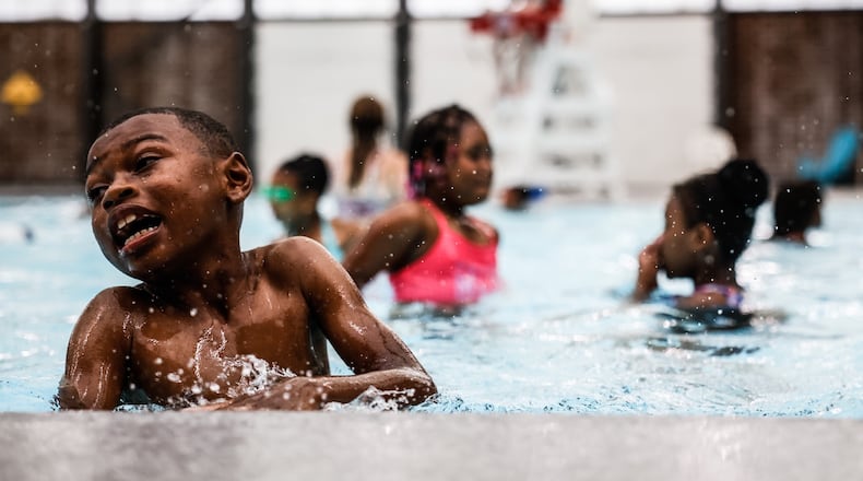 Derriyan Dunson, 8, plays in the pool during summer camp at Northwest Recreation Center Thursday June 10, 2021. Jim Noelker/staff