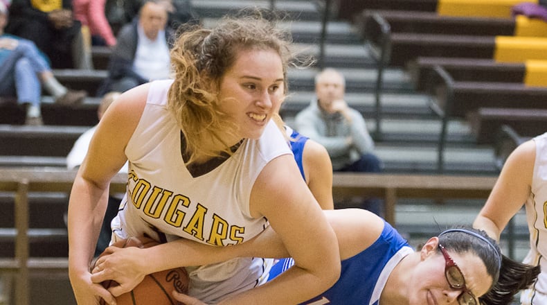 Mikala Morris of Kenton Ridge (left) is averaging 25.0 points, 22.0 rebounds, 4.3 assists and 3.8 blocks for the No. 3 (D-II) Cougars. FILE