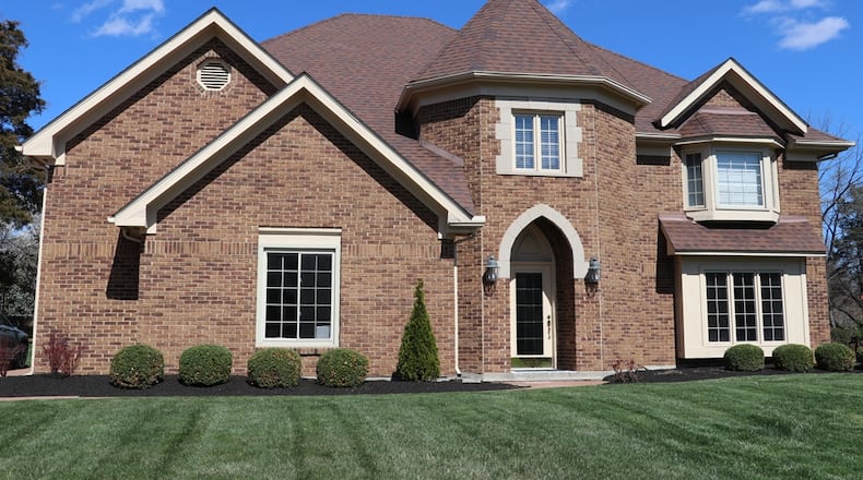 Listed for $489,000, the brick residence at 1949 Rustling Oak in Washington Twp. has about 3,460 square feet of living space. CONTRIBUTED PHOTOS/KATHY TYLER