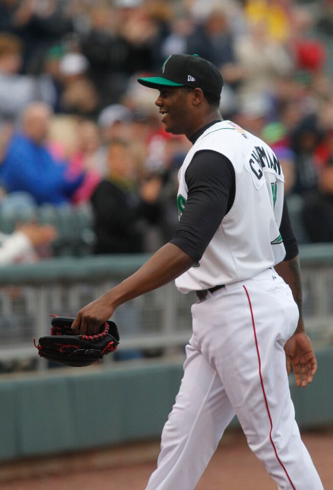 Reds Chapman Pitches for Dragons