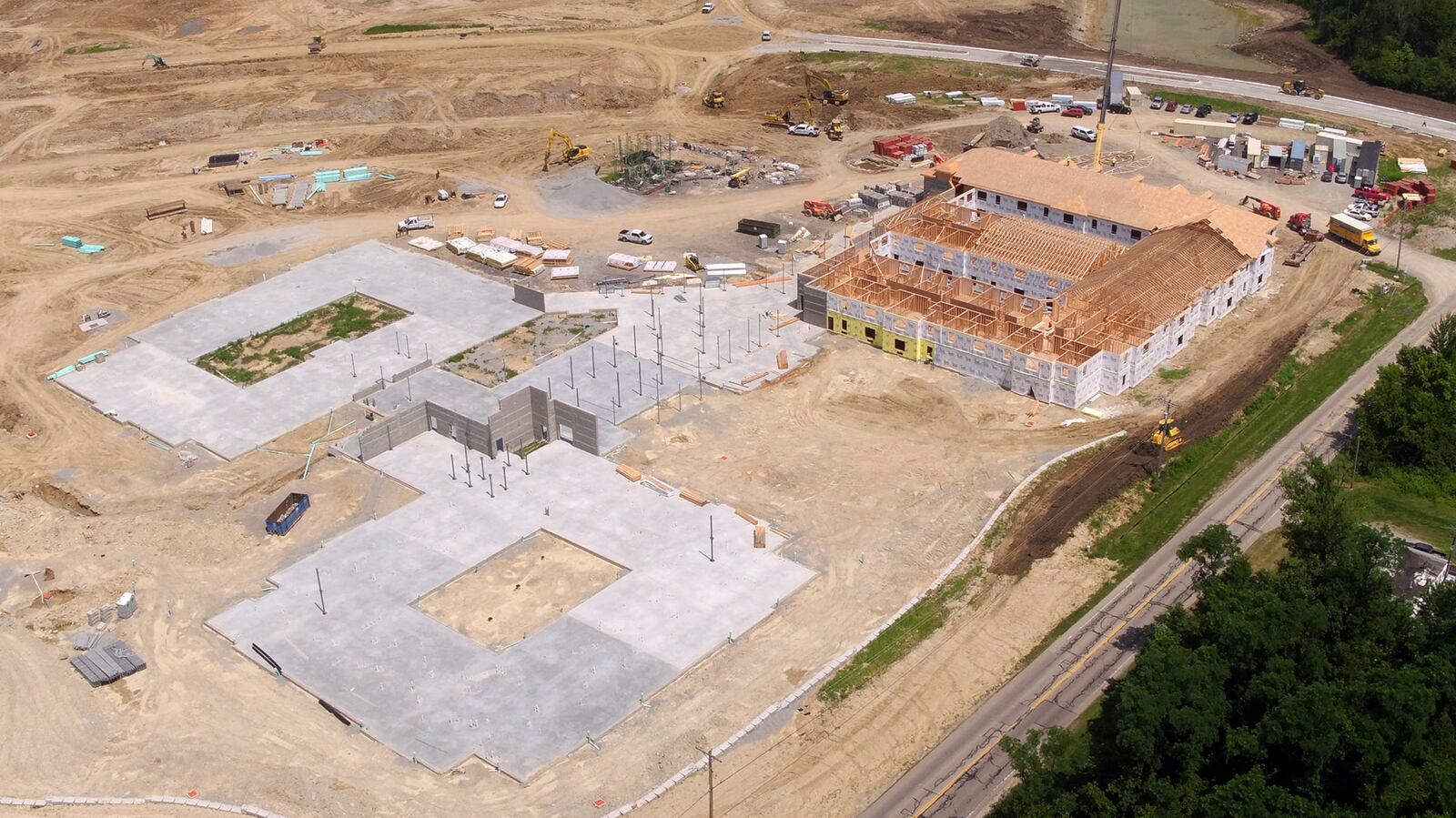 A huge chunk of land in Centerville is being developed for senior housing on the south side of town.  About 70 acres of the former Rabold Farm are being shaped into roads, lots and buildings for the Randall Residence of Centerville and Woodland Greens homesites at a cost of $42 million.  The new buildings currently under construction will house nearly 500 residents including assisted living apartments and memory support apartments with a total of 171,021-square-feet of space.  The balance of the land will be divided into lots for houses.   TY GREENLEES / STAFF