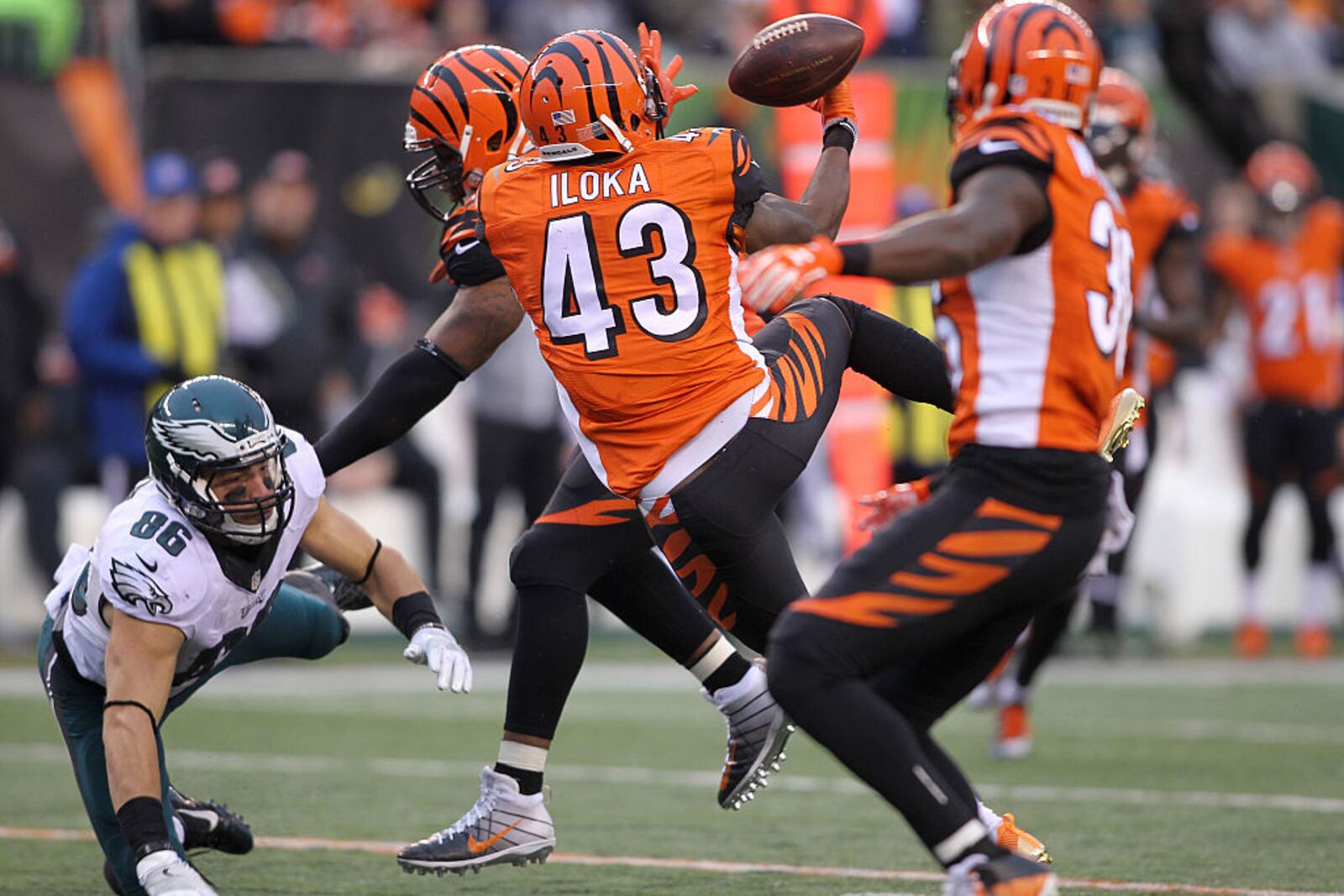 CINCINNATI, OH - DECEMBER 4:  George Iloka #43 of the Cincinnati Bengals breaks up a pass intended for Zach Ertz #86 of the Philadelphia Eagles, leading to an interception by Shawn Williams #36 of the Cincinnati Bengals during the fourth quarter at Paul Brown Stadium on December 4, 2016 in Cincinnati, Ohio. (Photo by John Grieshop/Getty Images)